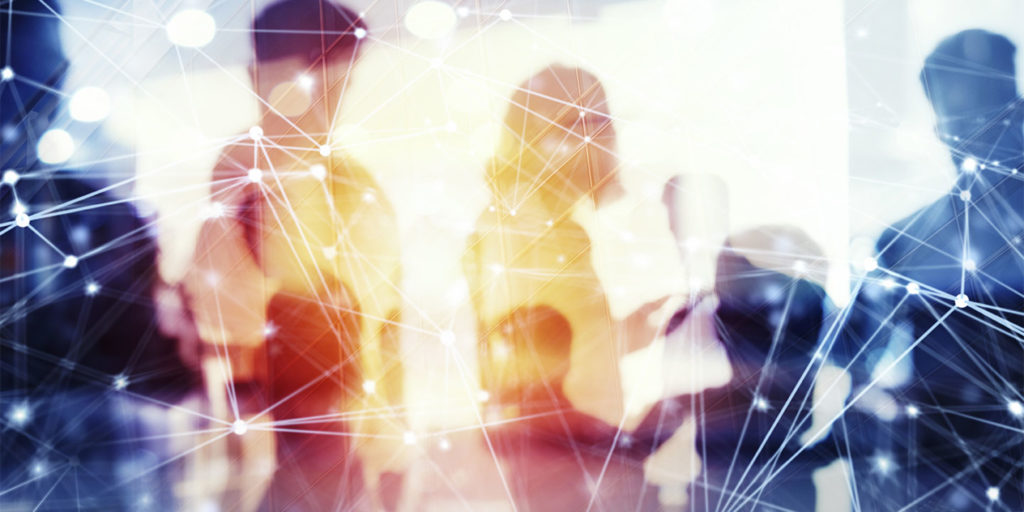silhouettes of people - two in sunlight - with network connections overlaid
