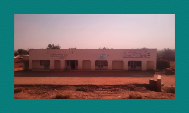 Can crisis preparedness prevent corruption in emergency responses? A single-story, light-colored commercial or clinic building with an open-air veranda, located along the bypass road near Zamkutu Trading Centre / Area 38 in Lilongwe, Malawi.